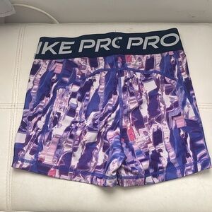 Nike Pro Women's Dri-FIT 3". Small. Lapis Purple